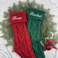traditional knit Christmas stockings for families

red green white knit holiday stockings

cozy handmade Christmas décor

classic old-fashioned Christmas stocking

custom embroidered family stockings