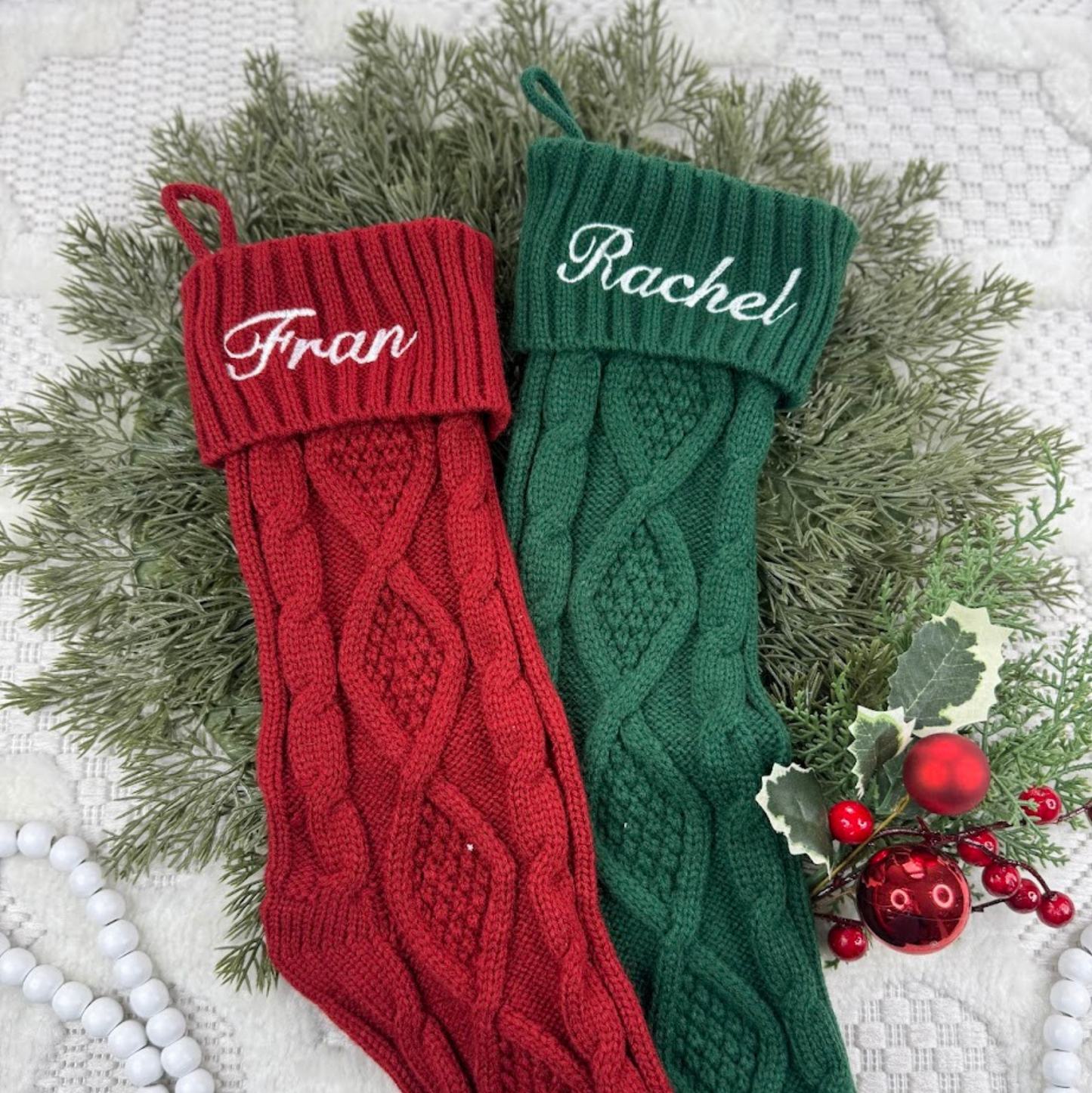 traditional knit Christmas stockings for families

red green white knit holiday stockings

cozy handmade Christmas décor

classic old-fashioned Christmas stocking

custom embroidered family stockings